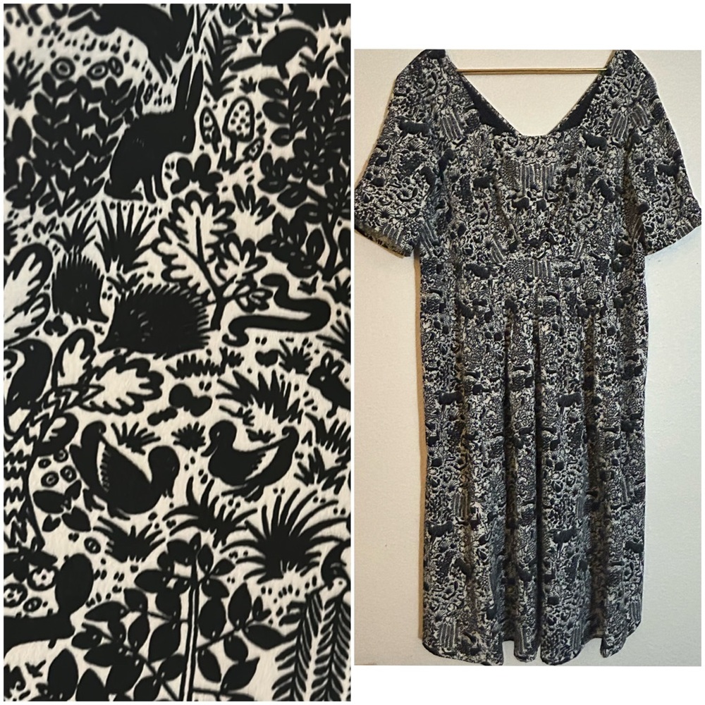 Plus size black and white woodland print tea length dress